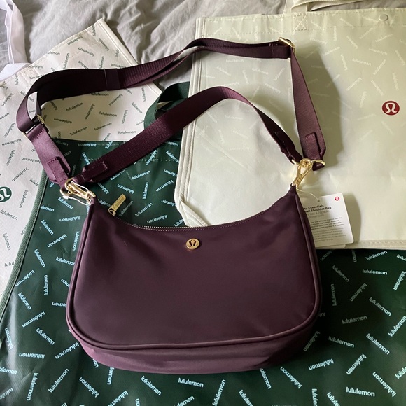 lululemon athletica Handbags - NWT Lululemon City Essentials Small Shoulder Bag, 3 L,  Black Plum/GOLD